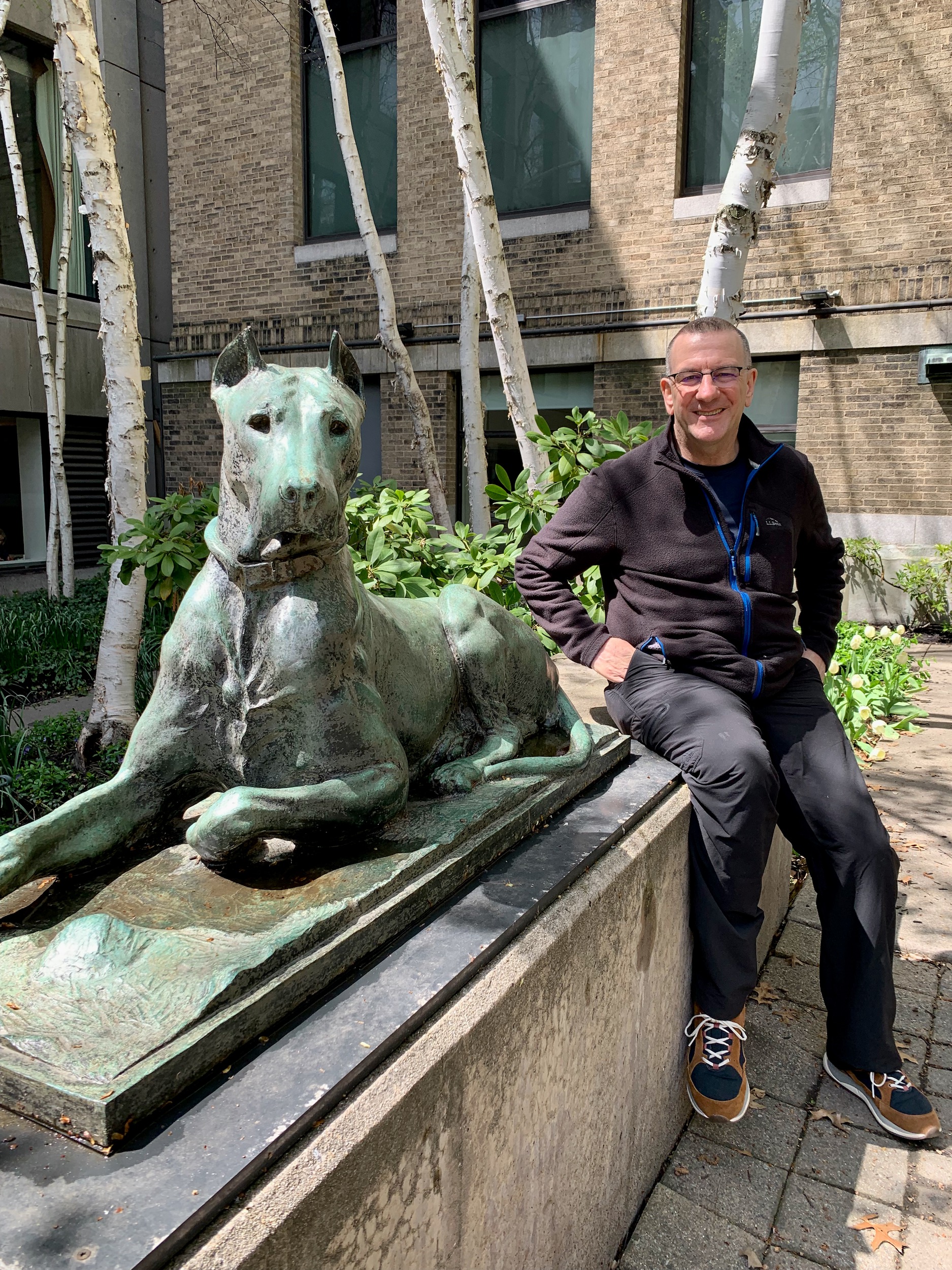 Dave in the MFA courtyard with a Great Dane statue